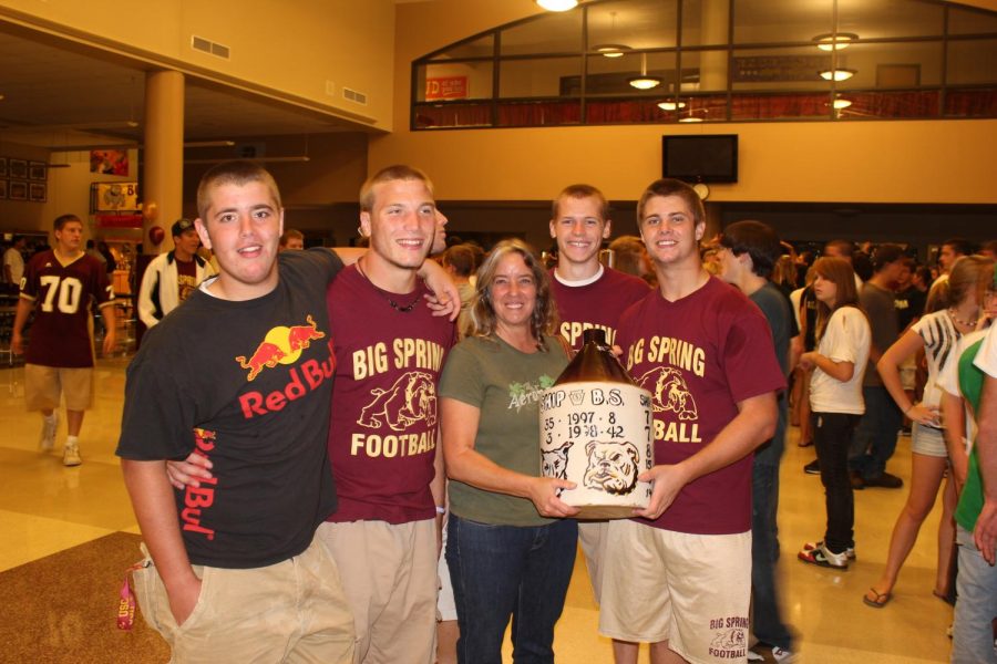 Members+of+the+2010+football+team+celebrate+with+the+Little+Brown+Jug+after+their+big+win+over+Shippensburg.+This+years+game+is+to+be+held+on+November+3%2C+2017+at+Shippensburg.