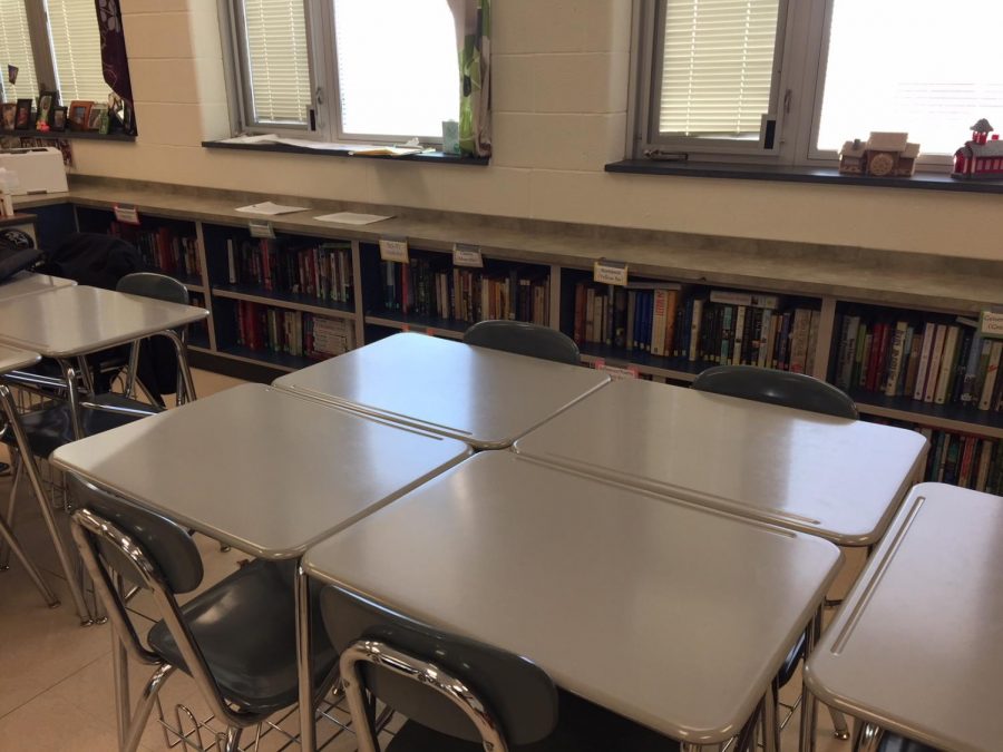 The old desk and hard-back chairs will be replaced next year with more comfortable options. Several classrooms will be making the transition.