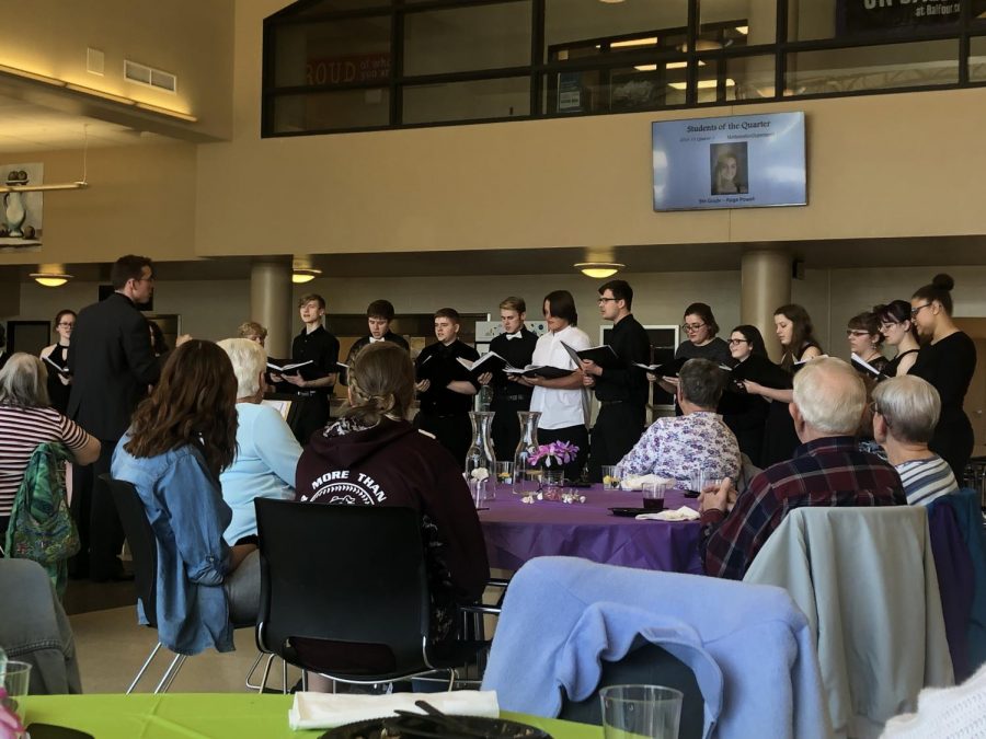 Cantabile+sings+for+the+seniors+as+they+finish+their+desert+with+some+beautiful+music.+
