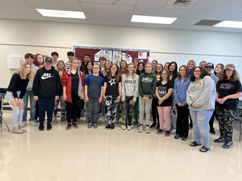 The Best Buddies Club pose for a picture at their Thanksgiving Party.