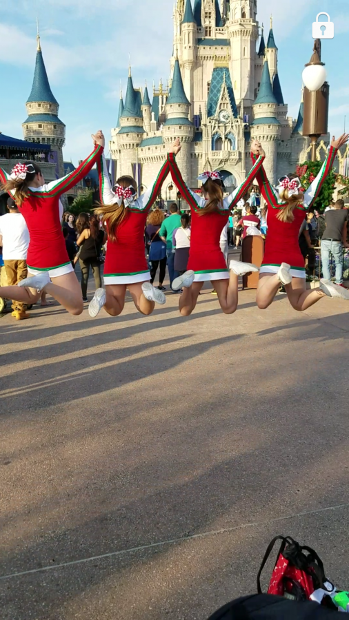 Cheerleaders perform in the Magic Kingdom